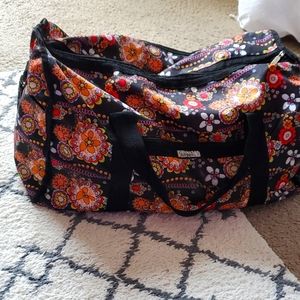 Large duffel bag with multi colored flower design